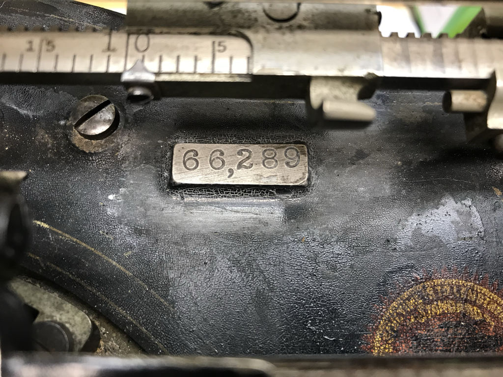 Serial number stamped on metal